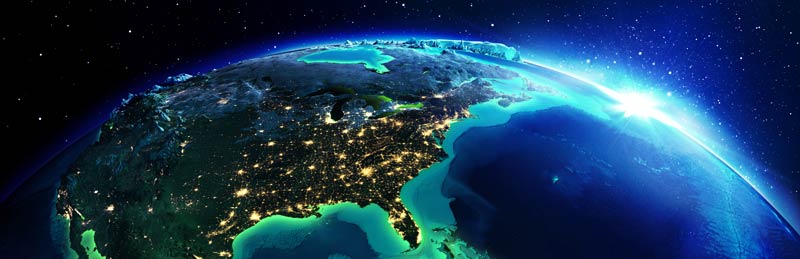 North America at night with the sun about to rise in the east